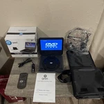 Onn 7 Portable Dvd Player Value Pack - Carrying Bag, Headphones, Charger. Fixed Price $44.99.