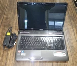 Toshiba Satellite L675D-S7052 17.3" Laptop For Parts Repair Includes Oem. Fixed Price $40.00.