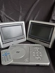 Kawasaki PVS1965 Dual Lcd Screen Mobile Portable Dvd Player W/ Remote & Case. Fixed Price $36.99.