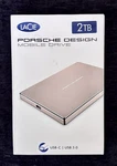 New Lacie Porsche Design Mobile Drive 2TB Usb-c Gold External Hdd STFD2000403. Fixed Price $125.00.