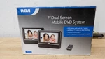 Rca 7" Dual Screen Mobile Dvd System DRC69702 New. Fixed Price $39.99.