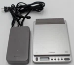 Used, Working Yamaha CRW-70 Cd-rw 24X Drive External Player W/ Power Adapter. Fixed Price $50.00.