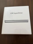 Apple Superdrive External Cd/dvd Usb-powered Mac MD564LL/A Sealed. Fixed Price $99.00.
